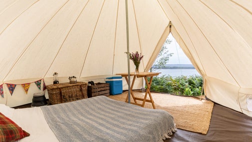 The interior of a bell tent at Brownsea Island Campsite, Dorset